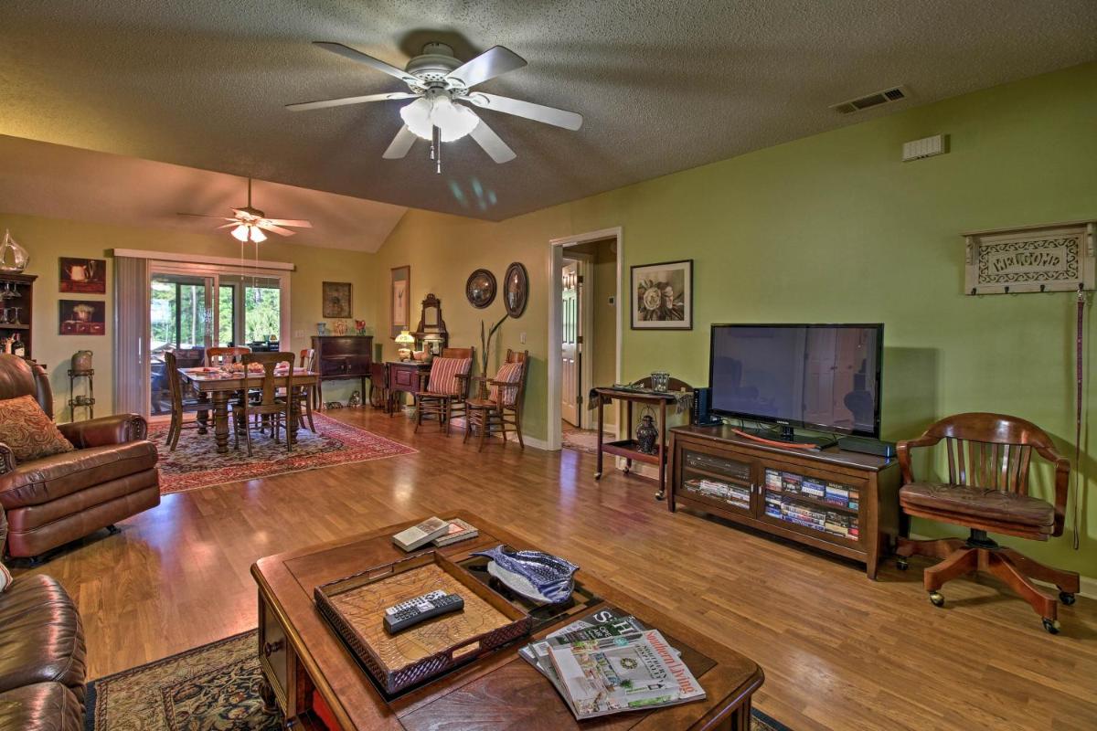 Waterfront Midway Home with Sunroom and Large Yard - Housity