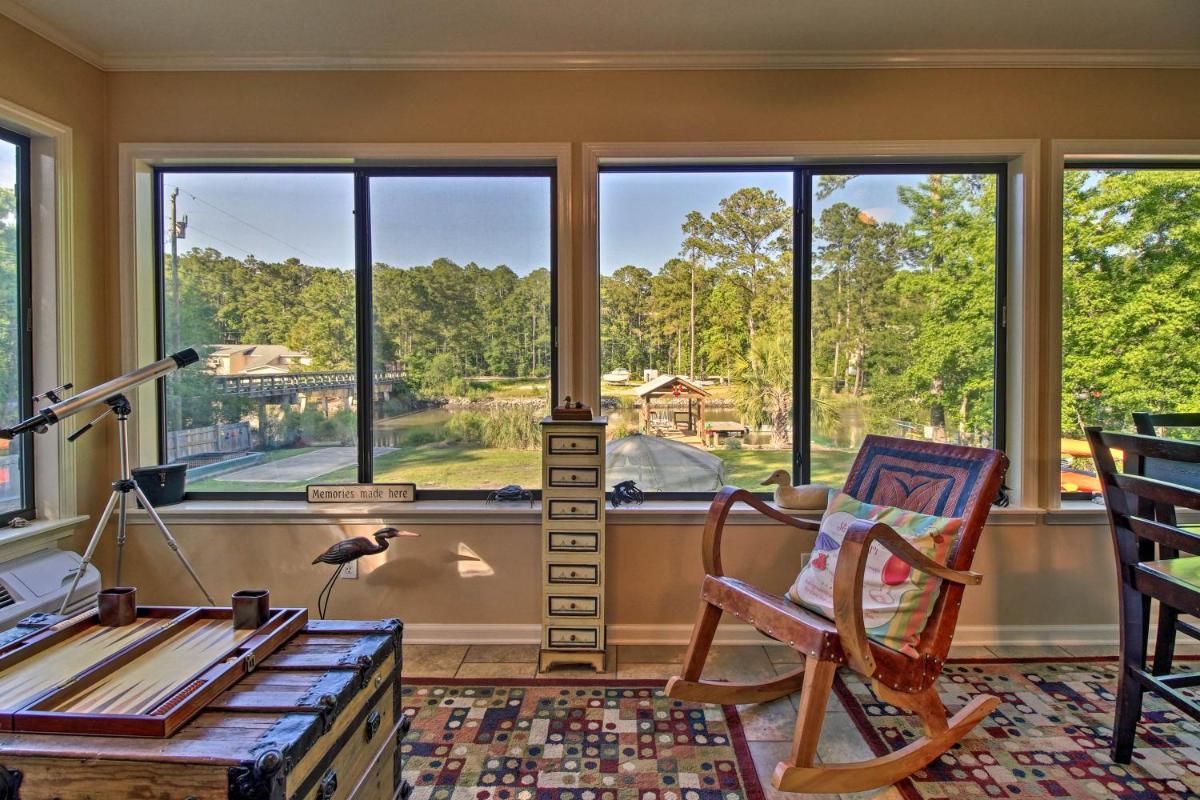Waterfront Midway Home with Sunroom and Large Yard - Housity