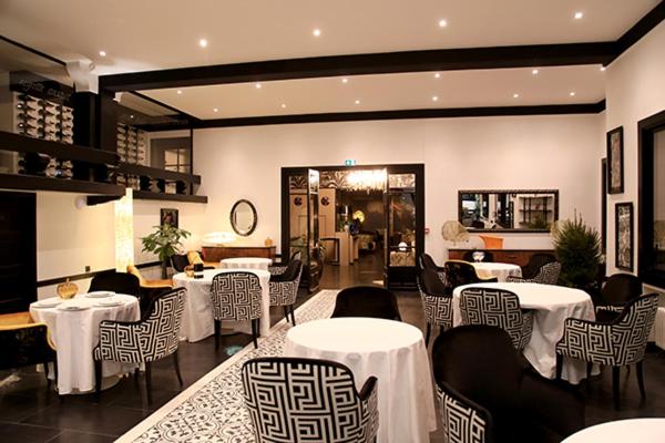 Coin salon dans l'établissement Hôtel du Barry Resort & Spa