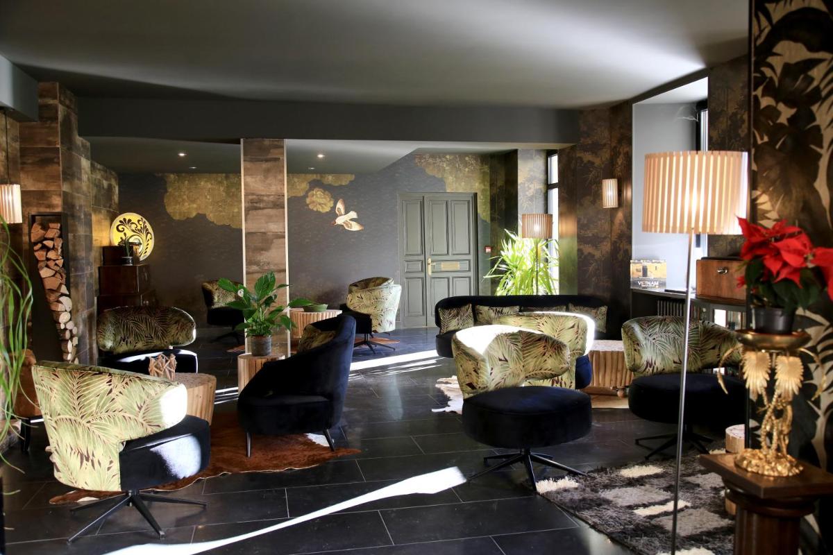 Coin salon dans l'établissement Hôtel du Barry Resort & Spa