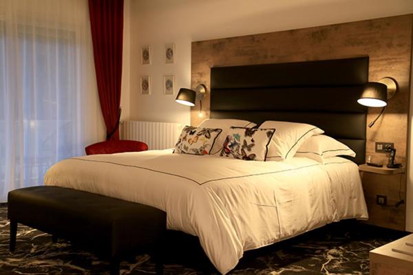 Un ou plusieurs lits dans un hébergement de l'établissement Hôtel du Barry Resort & Spa