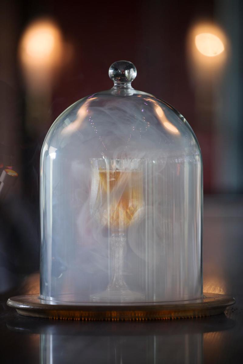 a glass cloche on top of a table at Taj Palace, New Delhi in New Delhi a glass cloche on top of a table at Taj Palace, New Delhi in New Delhi