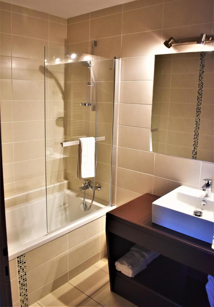 Salle de bains dans l'établissement Hotel Corrieu