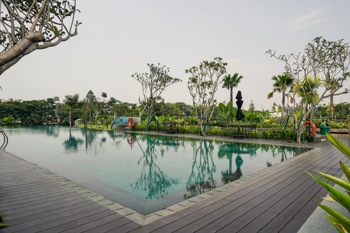 Elegant 2BR Citralake Suites Apartment By Travelio - Housity