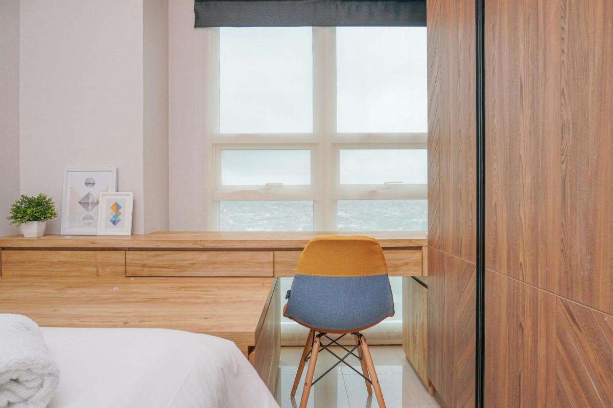 Elegant 2BR Citralake Suites Apartment By Travelio - Housity