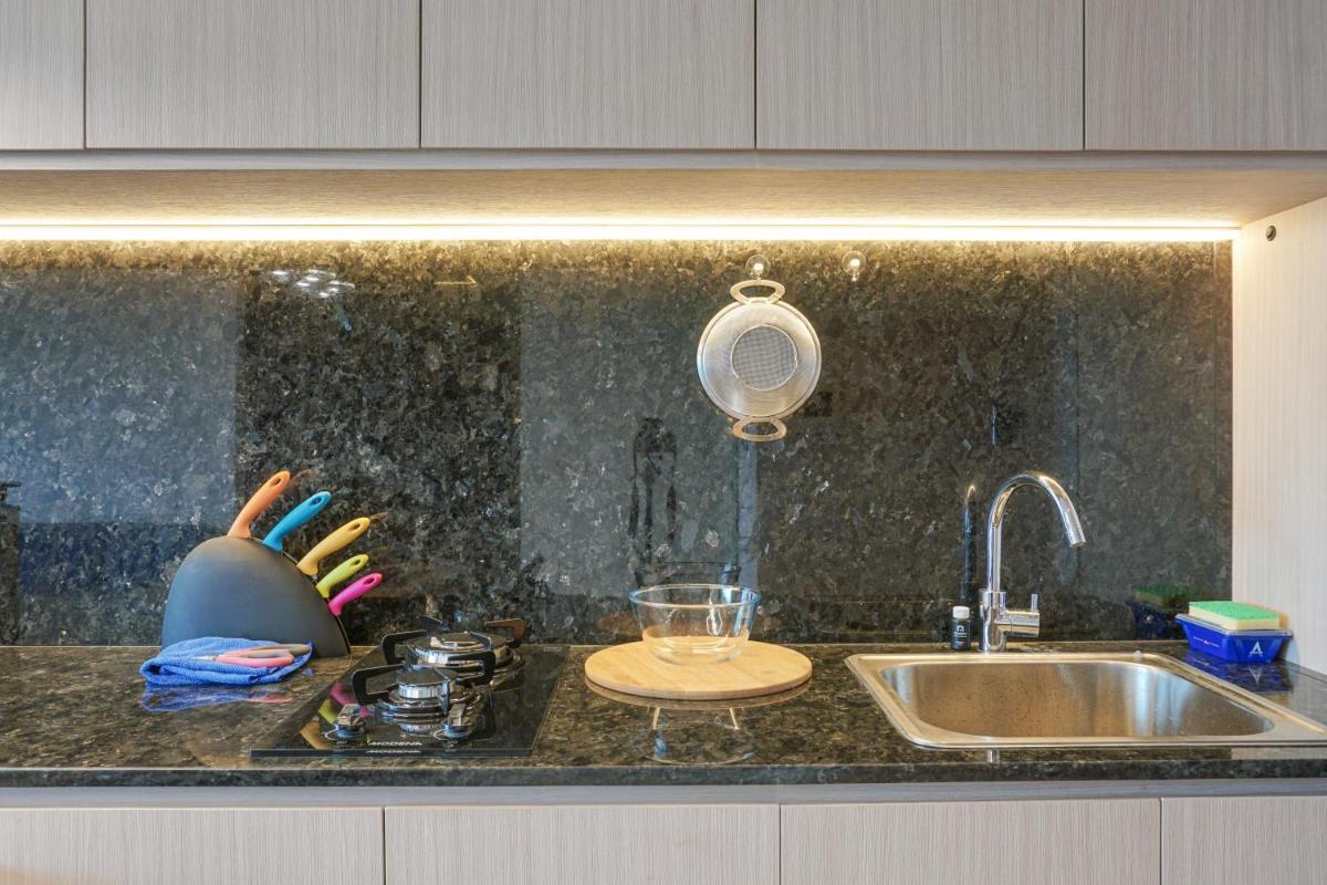 Elegant 2BR Citralake Suites Apartment By Travelio - Housity