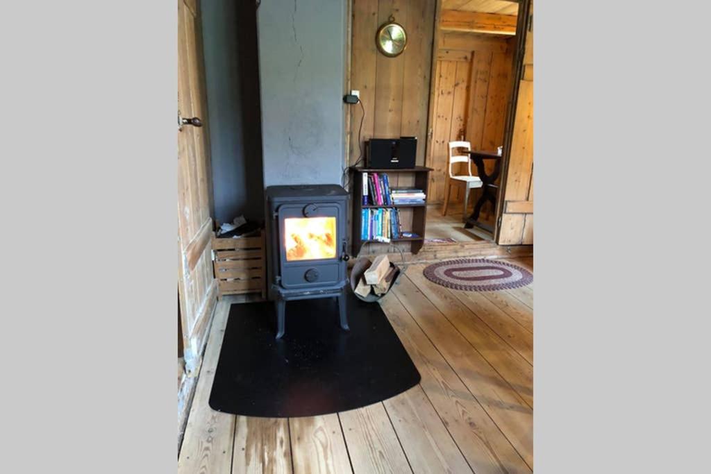 Turf house in Saksun with panoramic view - Housity