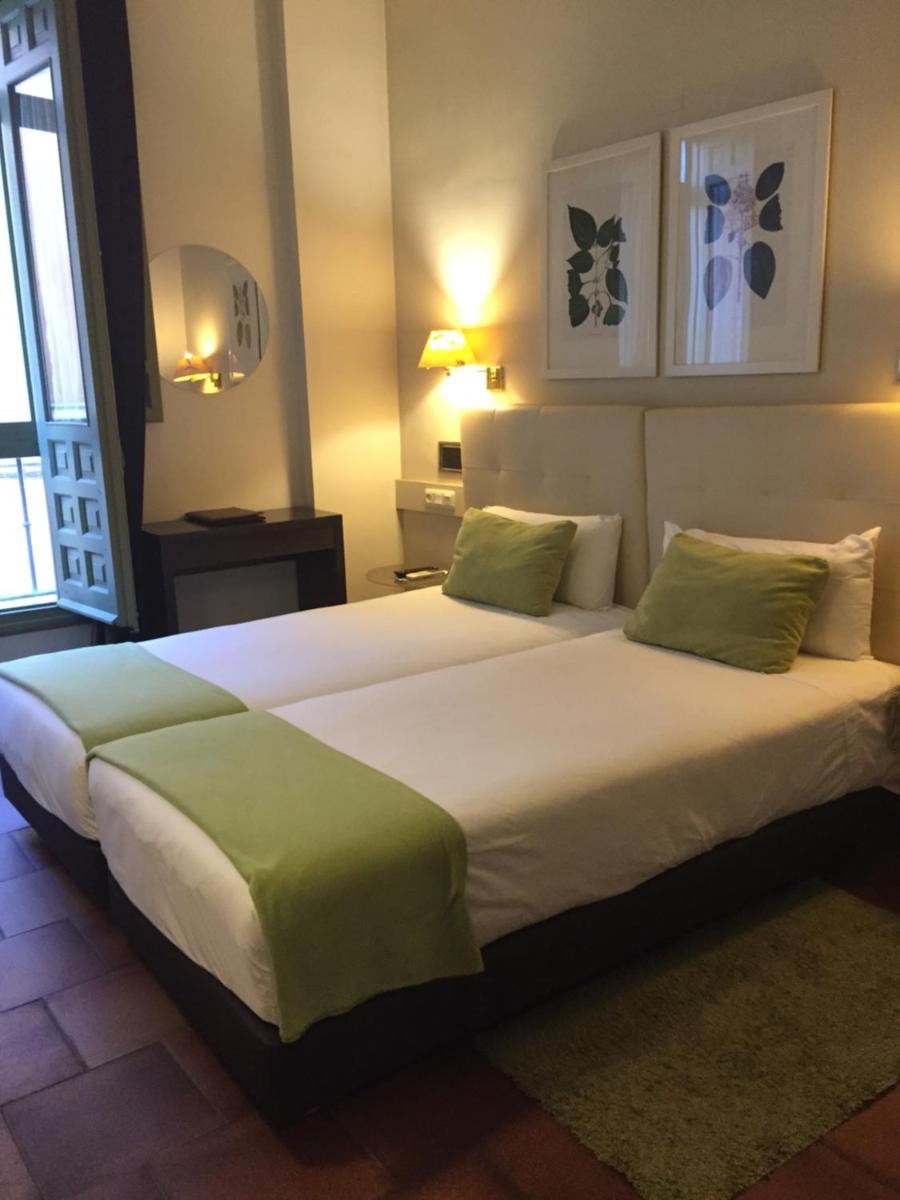 Cama o camas de una habitación en Hotel Leonor de Aquitania