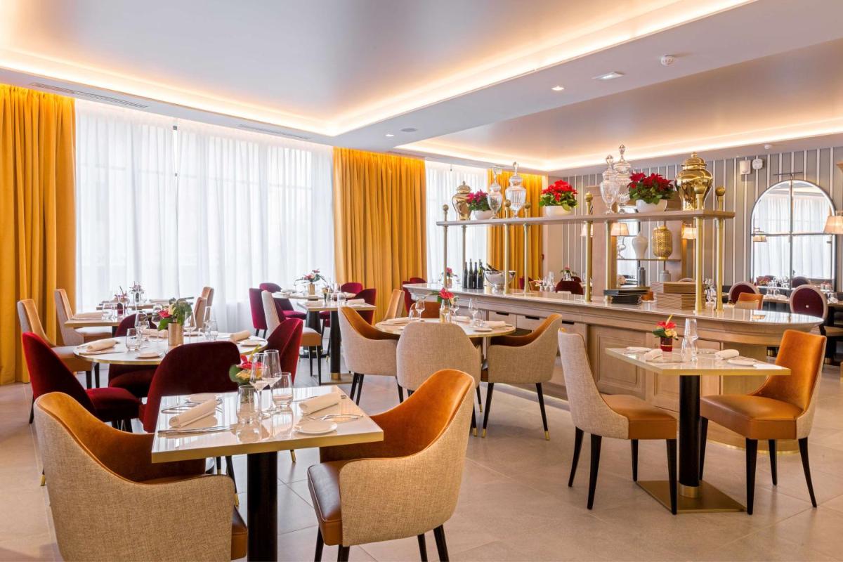 Restaurant ou autre lieu de restauration dans l'établissement Hôtel & Spa Les Sept Fontaines Best Western Premier