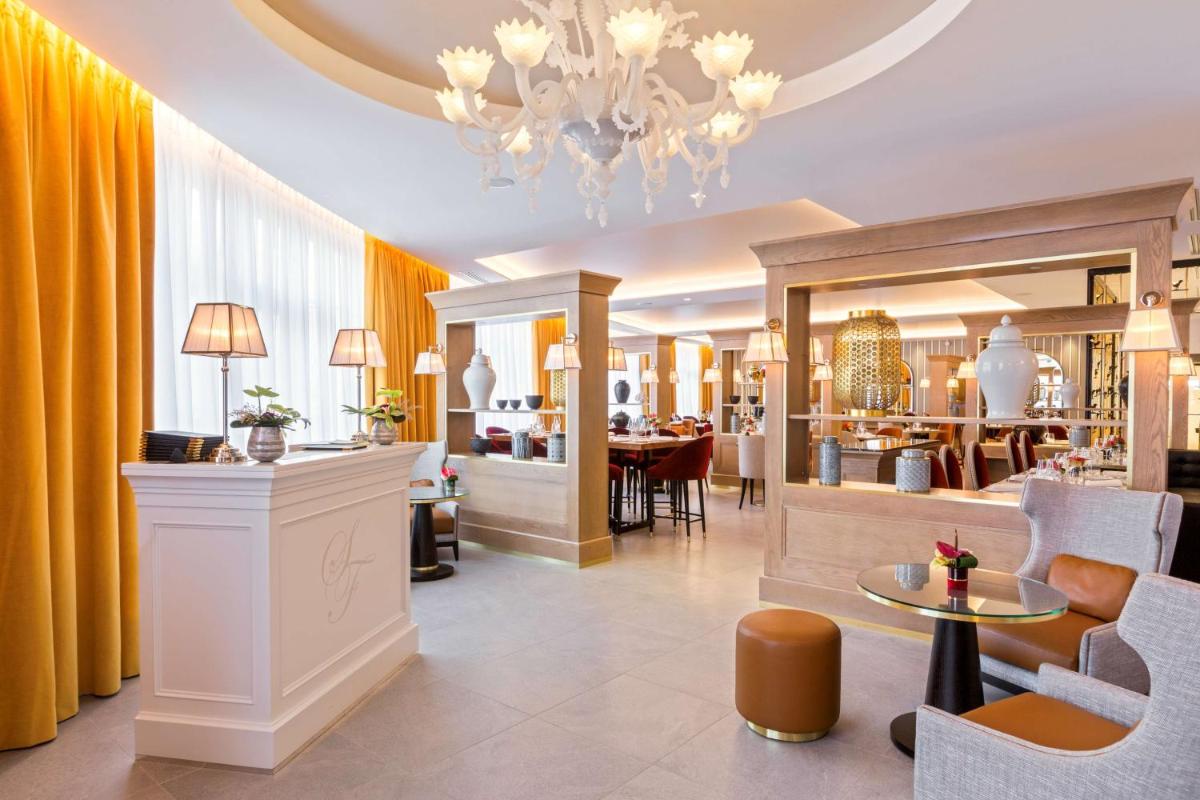 Restaurant ou autre lieu de restauration dans l'établissement Hôtel & Spa Les Sept Fontaines Best Western Premier