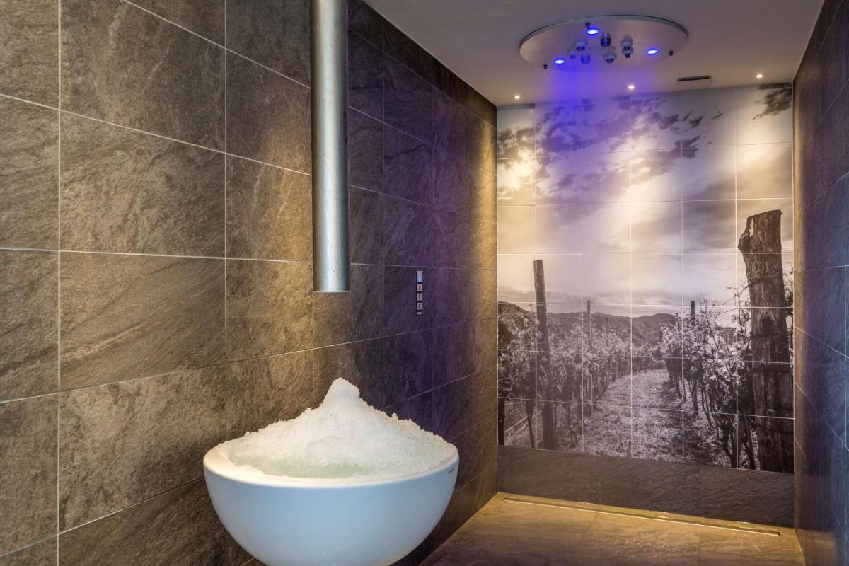 Salle de bains dans l'établissement Hôtel & Spa Les Sept Fontaines Best Western Premier