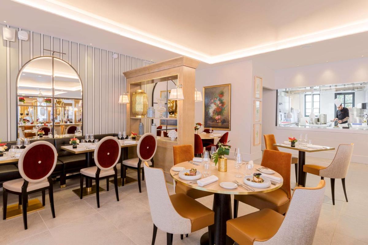 Restaurant ou autre lieu de restauration dans l'établissement Hôtel & Spa Les Sept Fontaines Best Western Premier