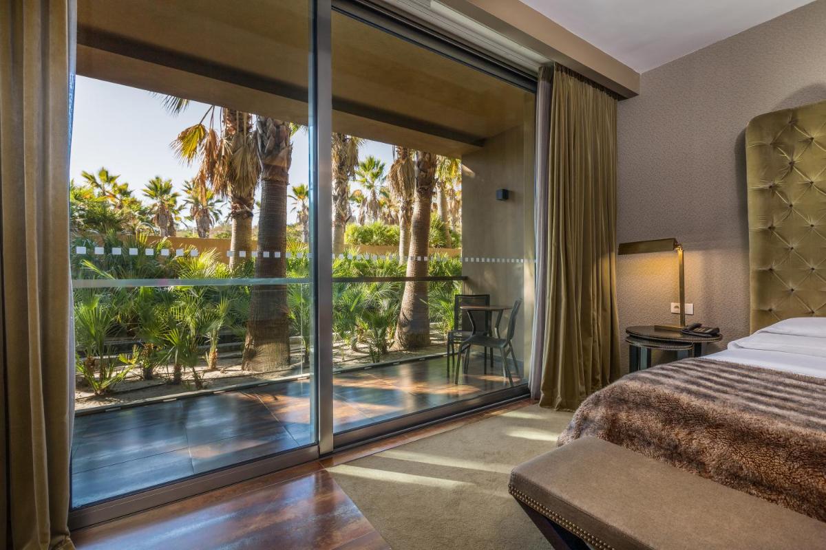 Uma cama ou camas num quarto em AP Lago Montargil - Conference & SPA