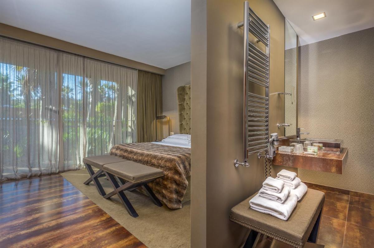 Uma cama ou camas num quarto em AP Lago Montargil - Conference & SPA
