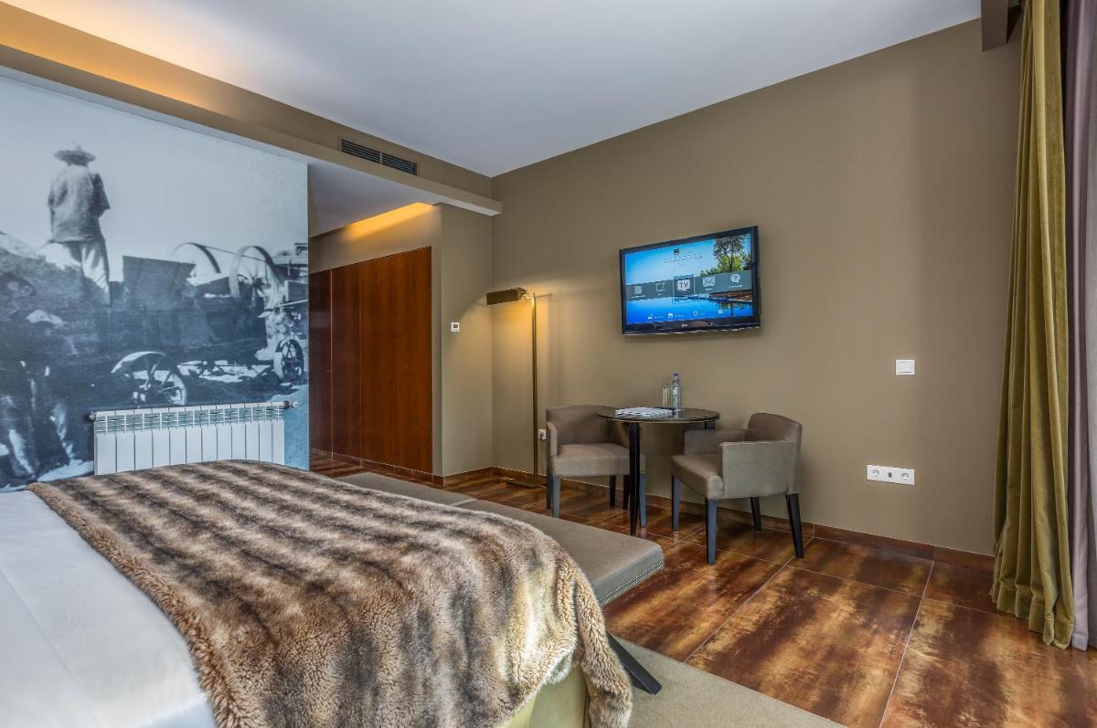 Uma cama ou camas num quarto em AP Lago Montargil - Conference & SPA