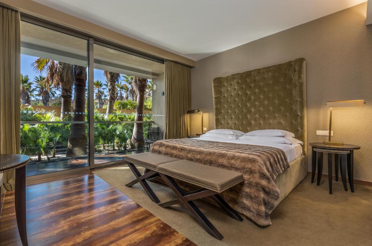 Uma cama ou camas num quarto em AP Lago Montargil - Conference & SPA
