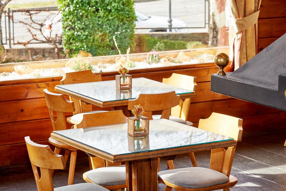 Un restaurante o sitio para comer en Hotel Grèvol Spa