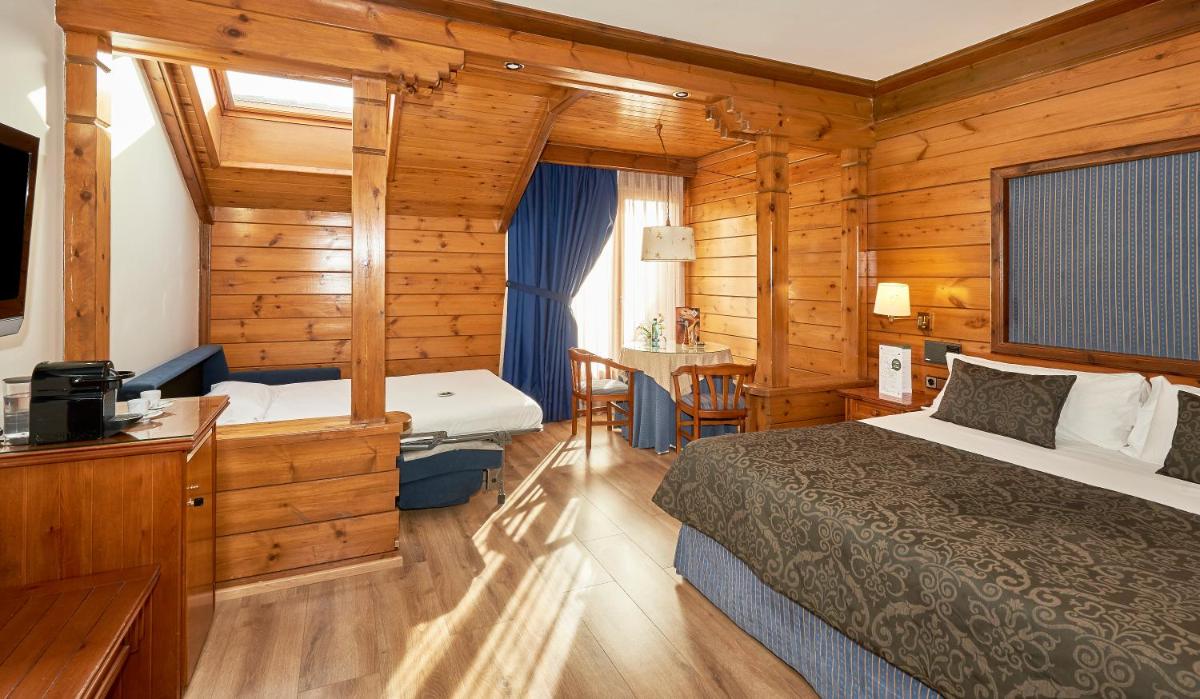Cama o camas de una habitación en Hotel Grèvol Spa