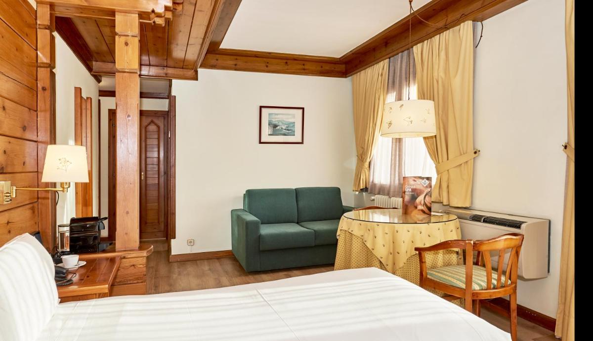 Cama o camas de una habitación en Hotel Grèvol Spa