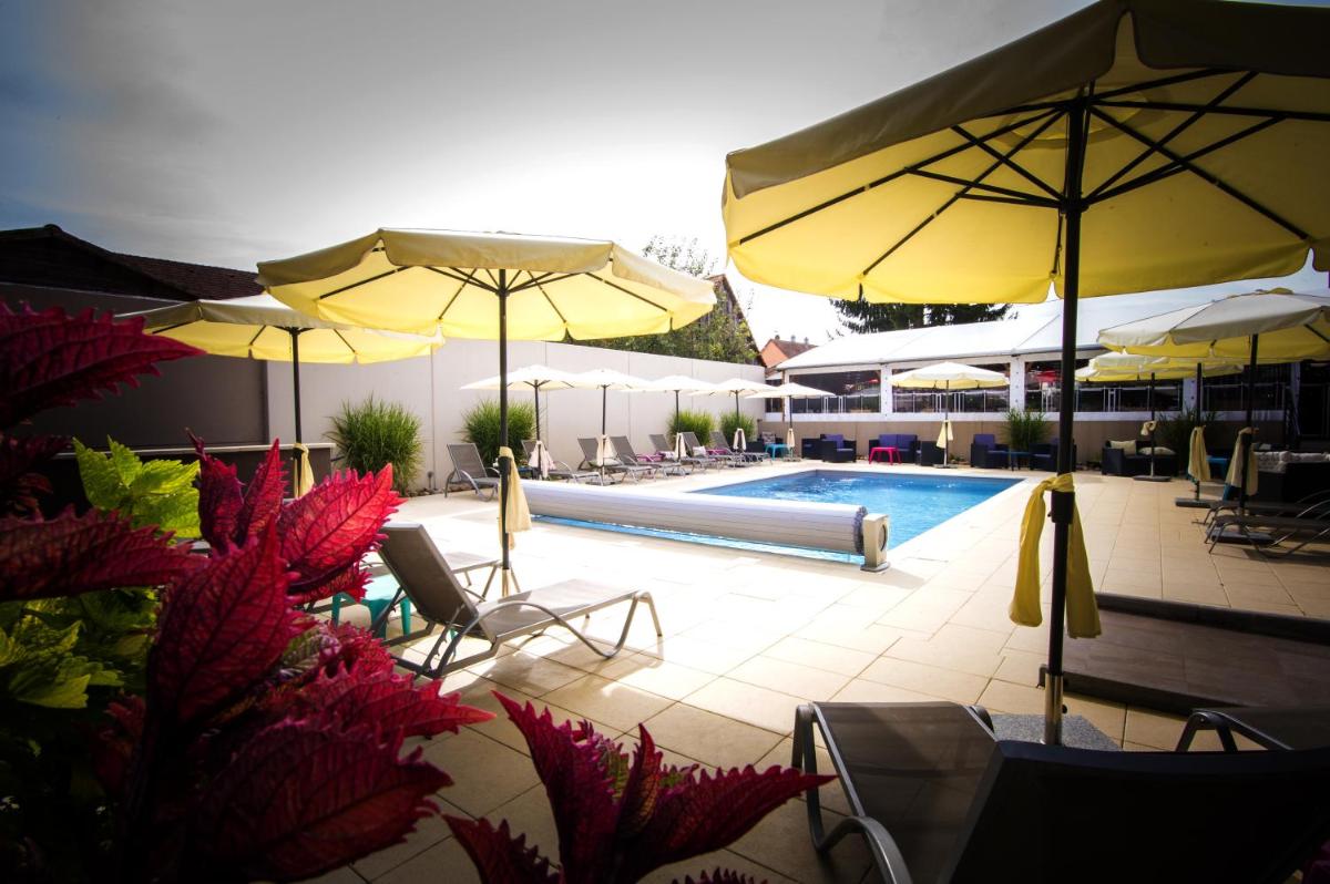 Piscine de l'établissement Au Soleil, Hôtel Restaurant & Spa ou située à proximité