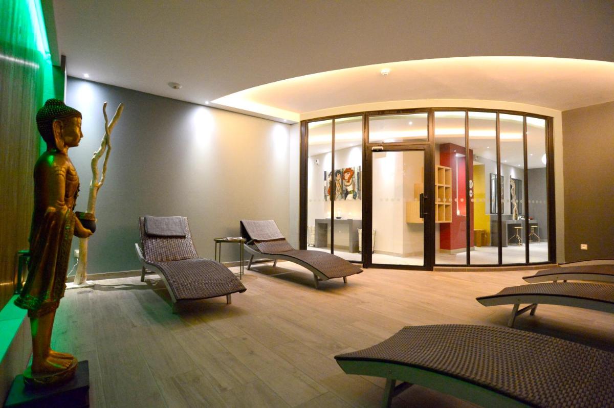 Coin salon dans l'établissement Au Soleil, Hôtel Restaurant & Spa