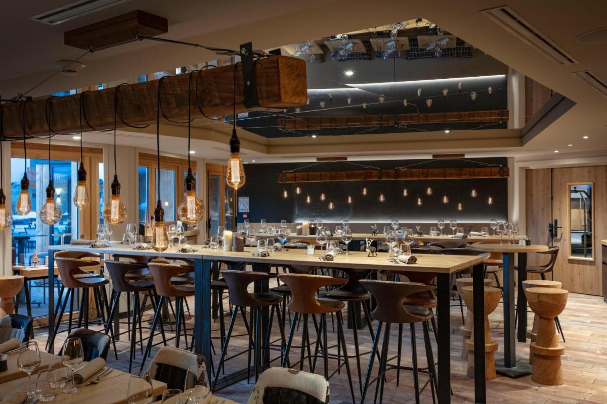 Restaurant ou autre lieu de restauration dans l'établissement Grandes Rousses Hotel & Spa