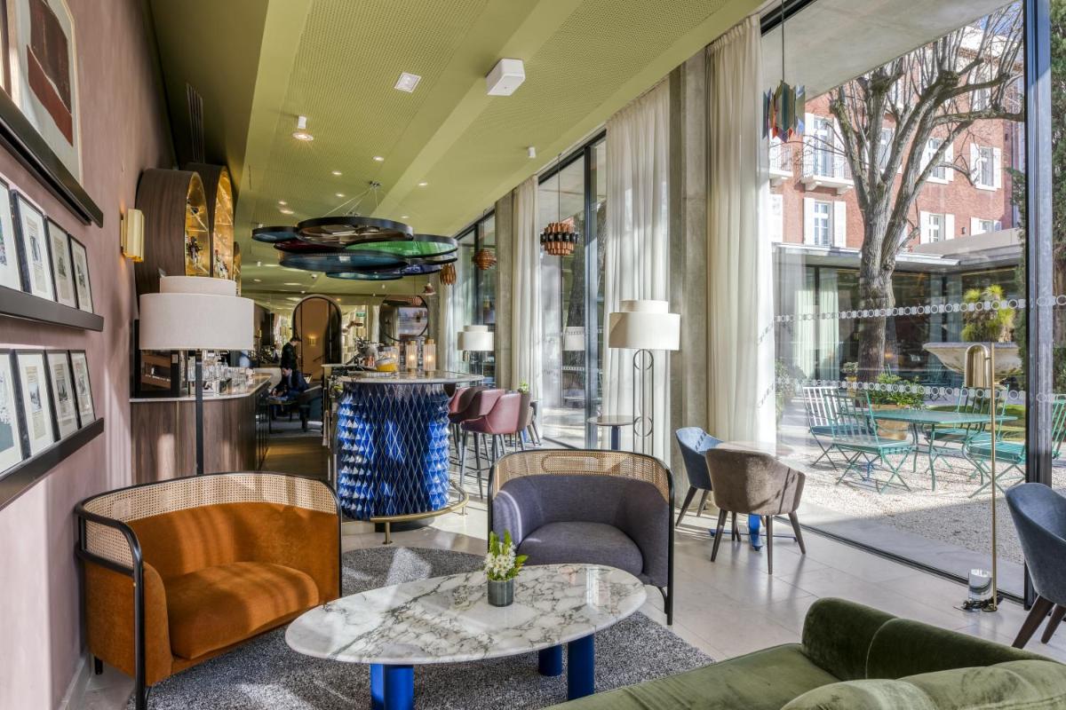 Coin salon dans l'établissement Maison Albar Hotels L’Imperator