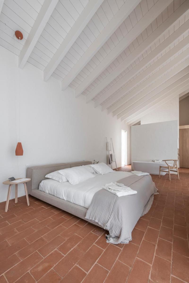 Uma cama ou camas num quarto em Herdade da Malhadinha Nova - Relais & Châteaux