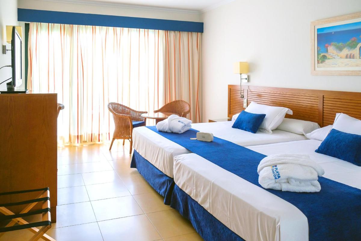 Cama o camas de una habitación en Playamarina