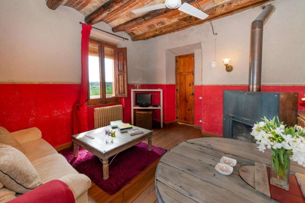 Zona de estar de Les Vinyes Alojamiento Rural Boutique & SPA