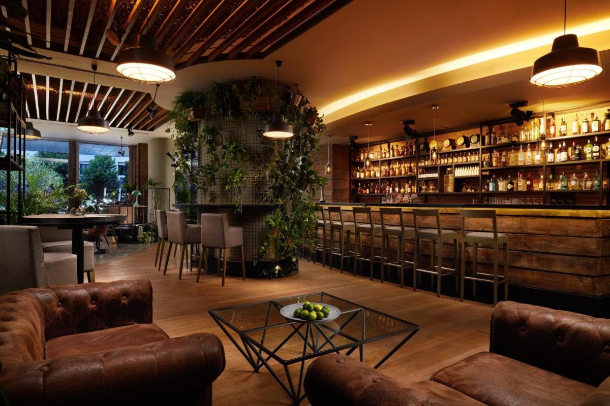 Uma área de estar em Corinthia Lisbon