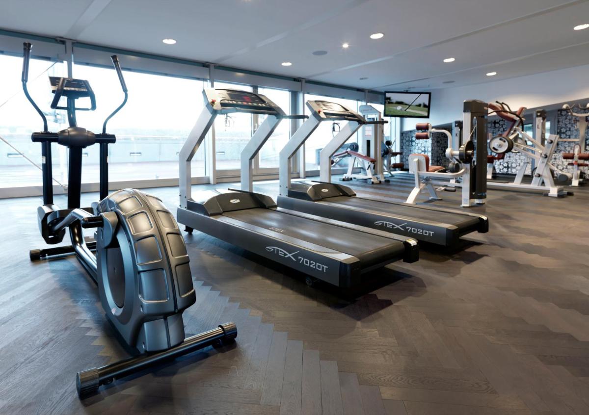 Das Fitnesscenter und/oder die Fitnesseinrichtungen in der Unterkunft Kameha Grand Bonn Das Fitnesscenter und/oder die Fitnesseinrichtungen in der Unterkunft Kameha Grand Bonn