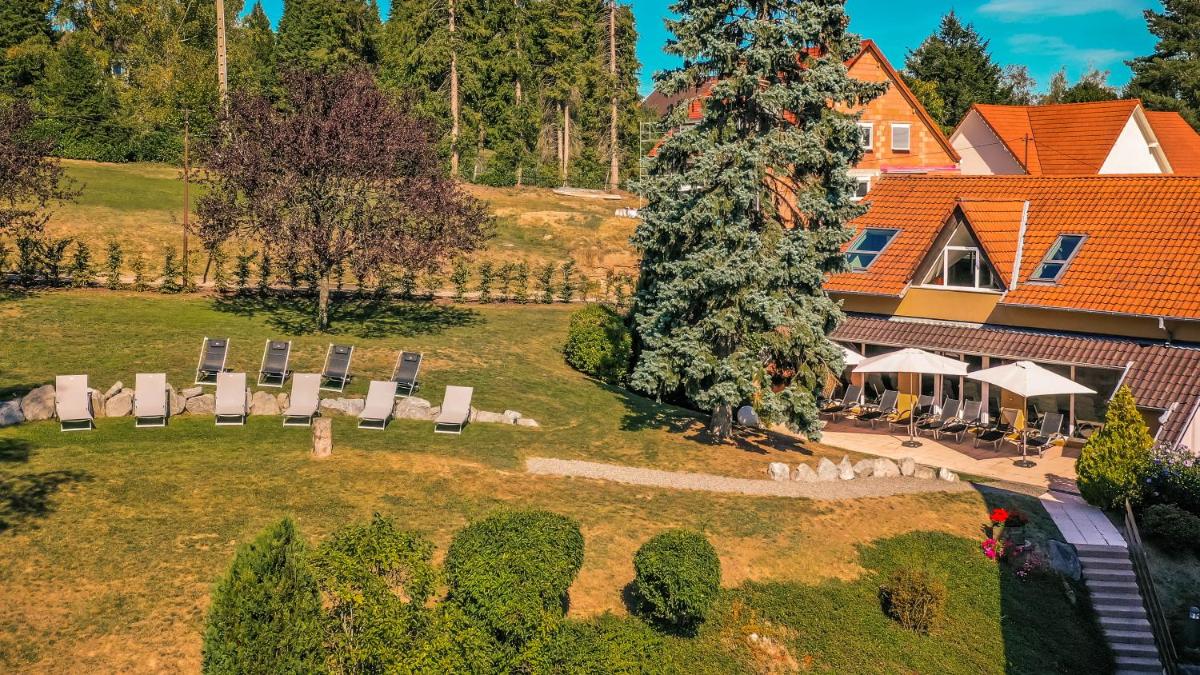 Jardin de l'établissement Hotel Spa et Restaurant Au Chasseur