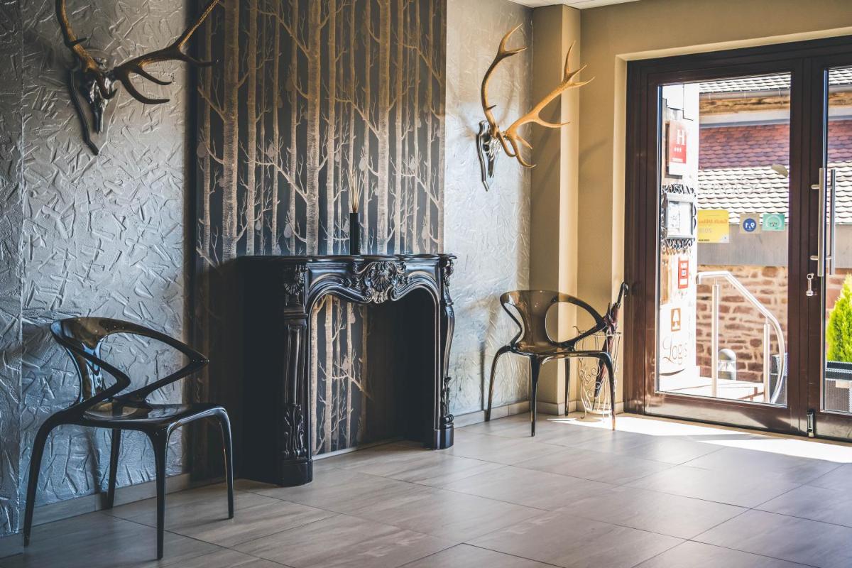Photo de la galerie de l'établissement Hotel Spa et Restaurant Au Chasseur, à Birkenwald