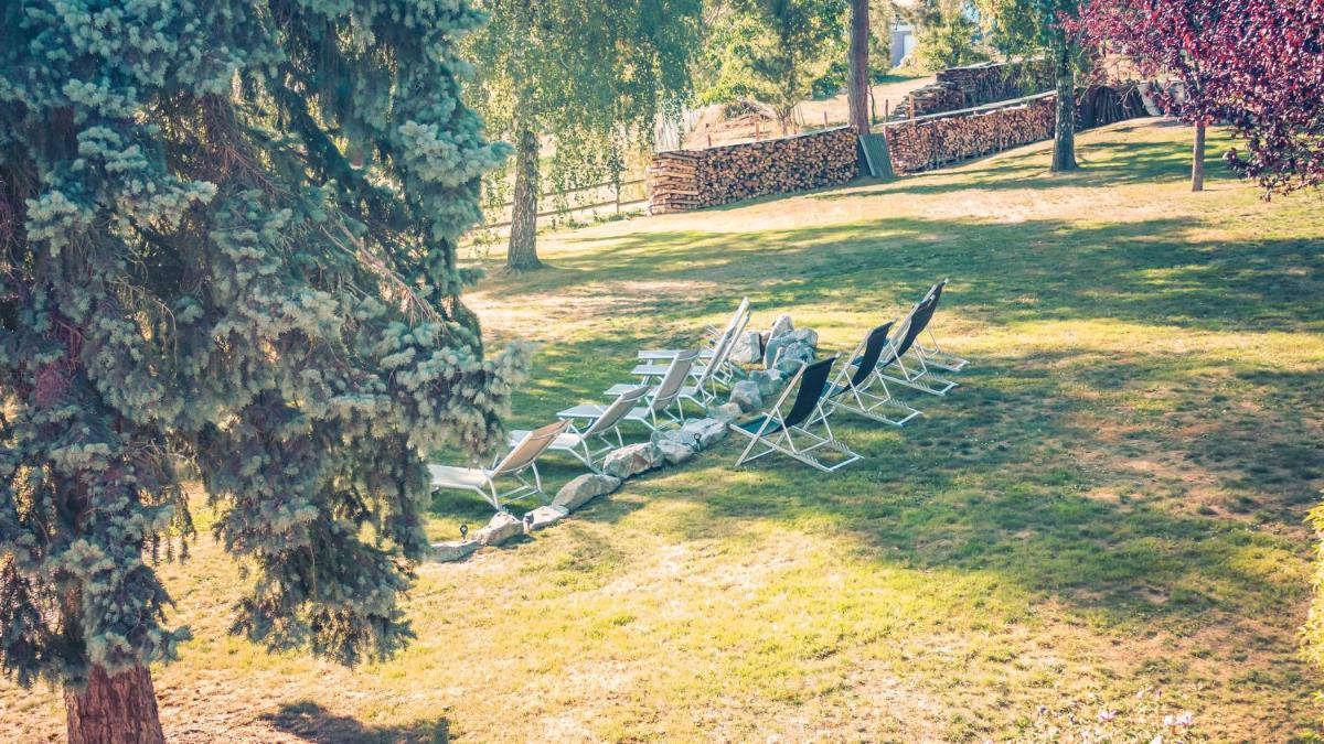 Jardin de l'établissement Hotel Spa et Restaurant Au Chasseur