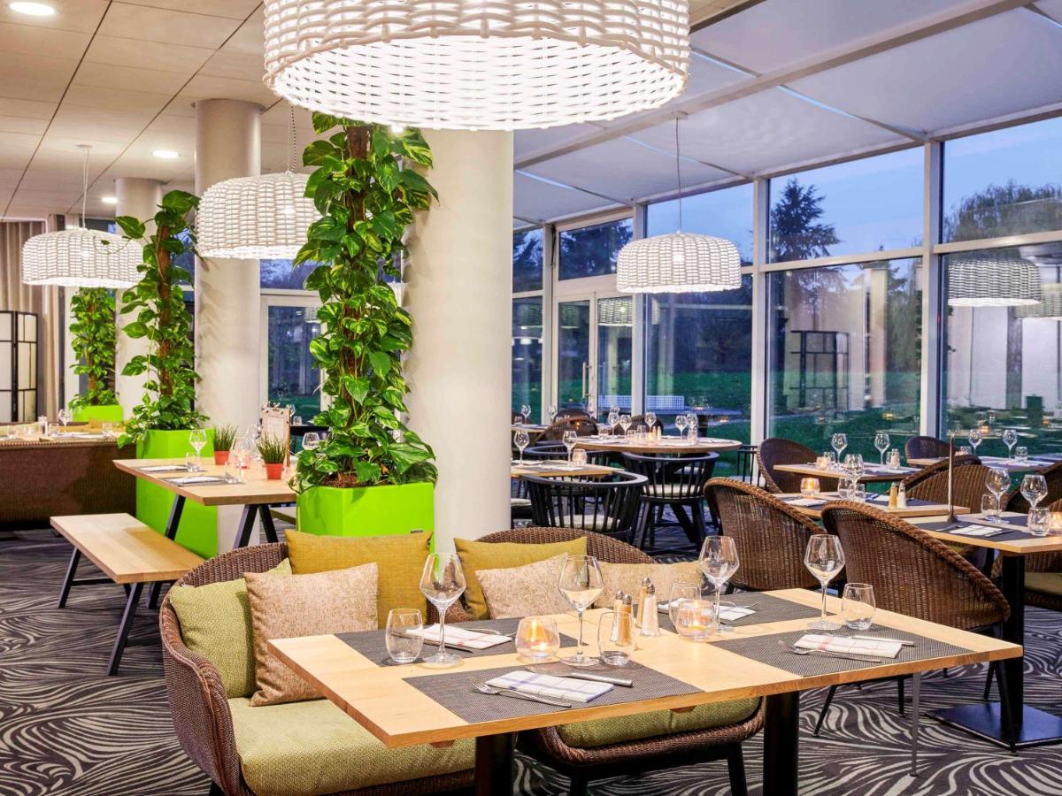 Restaurant ou autre lieu de restauration dans l'établissement Novotel Senart Golf De Greenparc