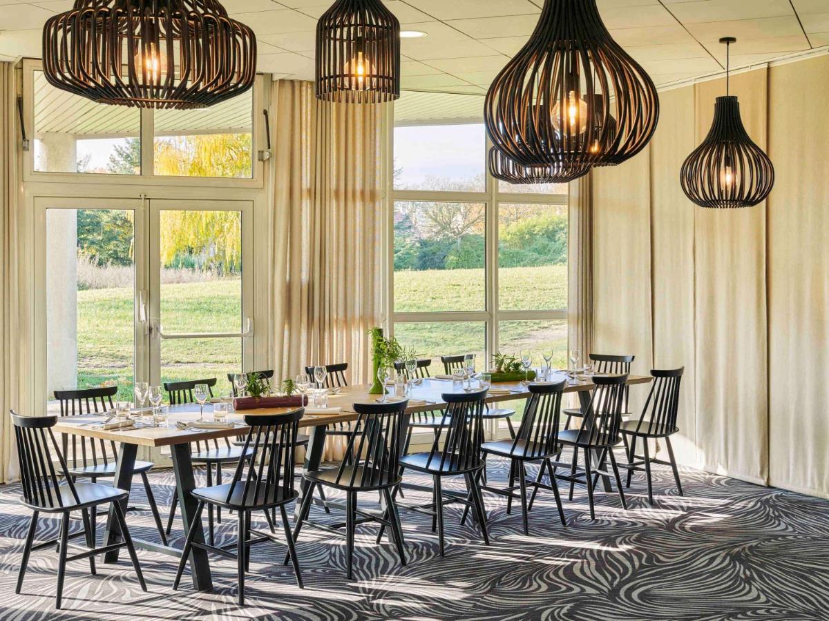 Restaurant ou autre lieu de restauration dans l'établissement Novotel Senart Golf De Greenparc