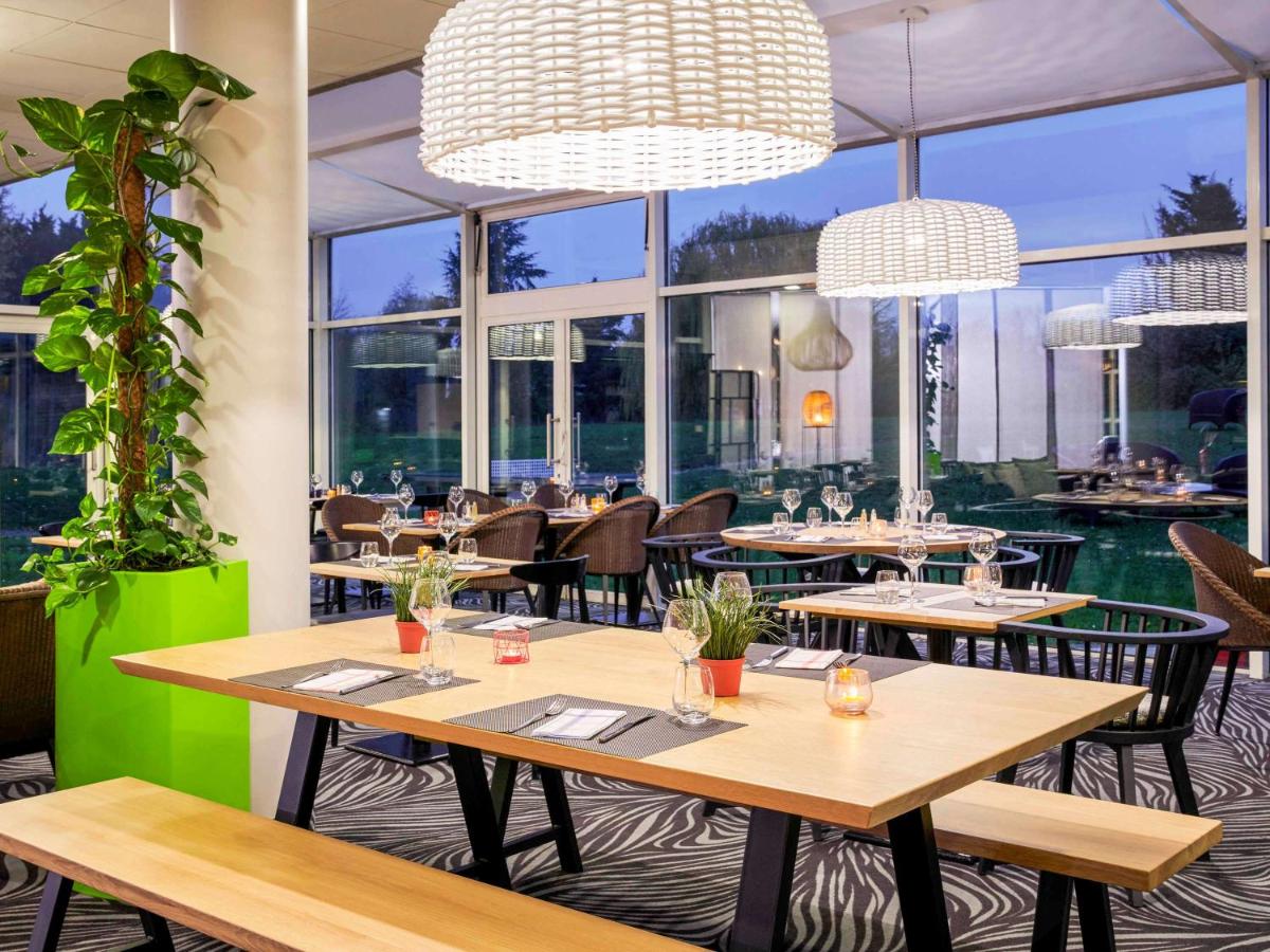 Restaurant ou autre lieu de restauration dans l'établissement Novotel Senart Golf De Greenparc