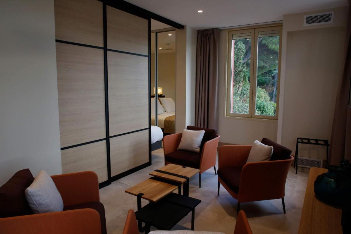 Coin salon dans l'établissement Splendid Hôtel & Spa