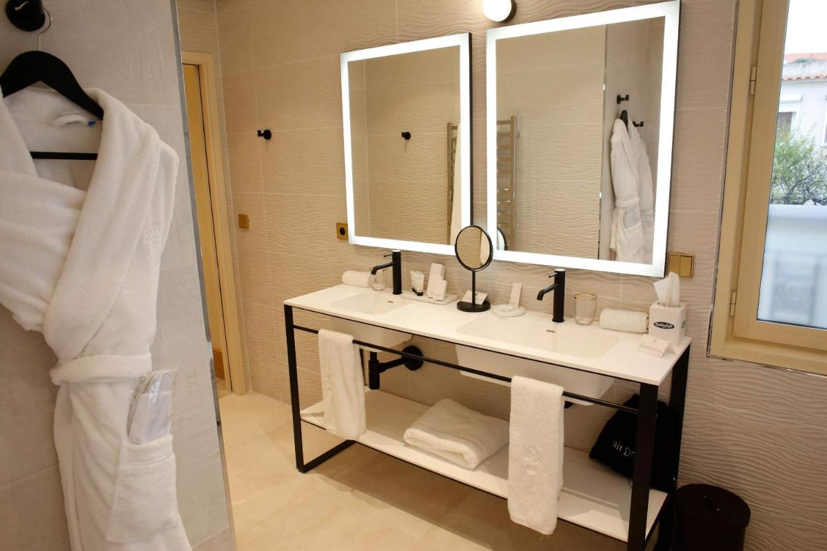Salle de bains dans l'établissement Splendid Hôtel & Spa