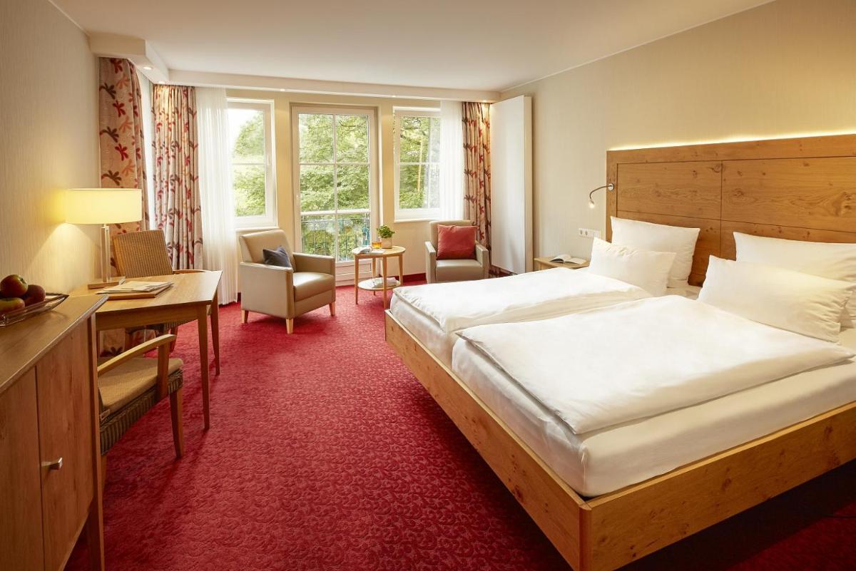 Ein Bett oder Betten in einem Zimmer der Unterkunft Hotel Deimann