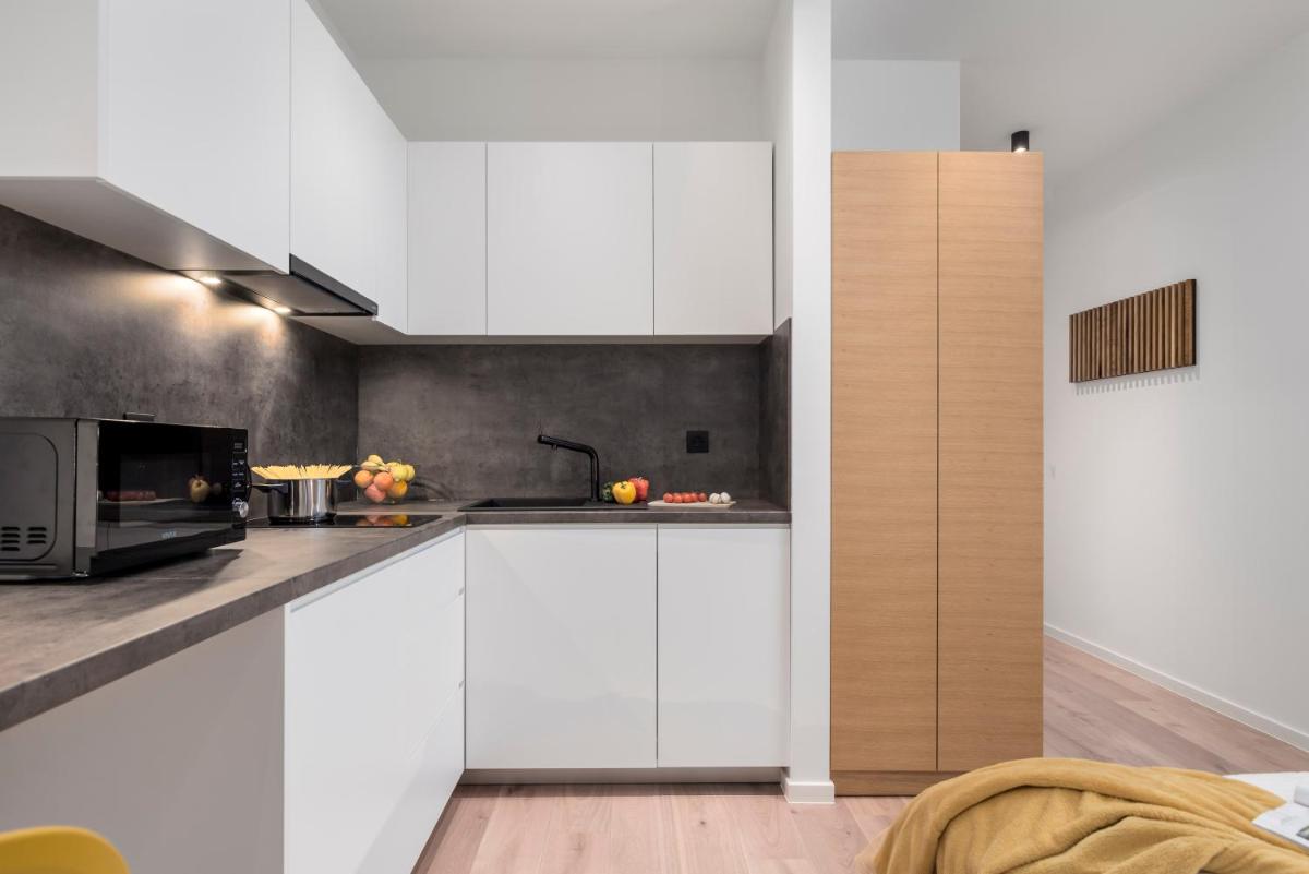 Deluxe Apartments & Rooms "In the Center" - Housity