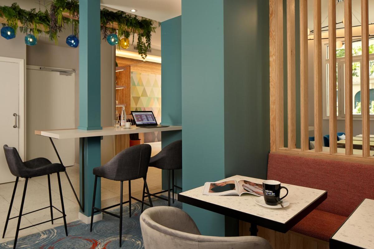 Télévision ou salle de divertissement dans l'établissement Hotel Locomo - Gare de Lyon Bastille