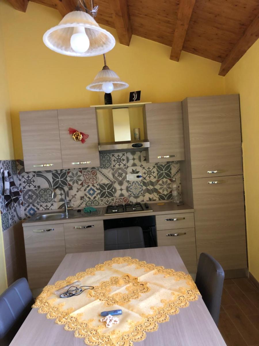 Basicò un balcone sul mare-Casa I CARRUGGI- Case vacanza Sicilia&Toscana- - Housity