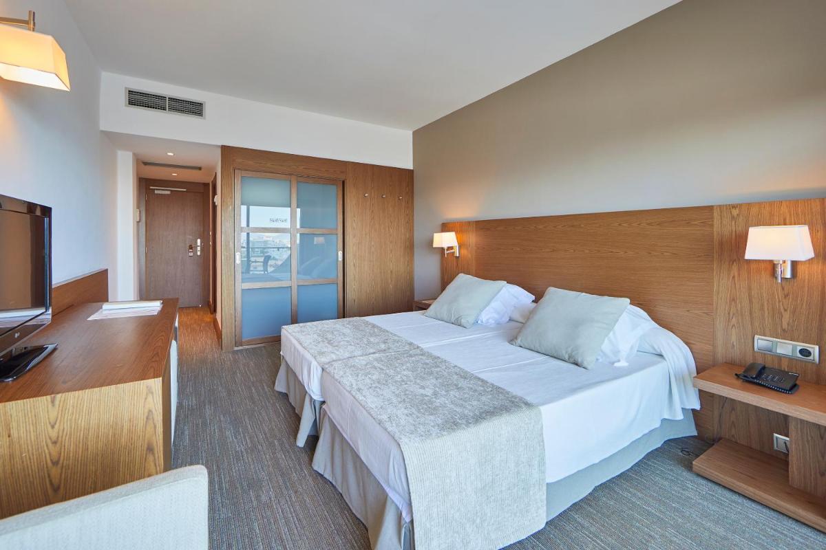 Cama o camas de una habitación en Hotel Playa Golf - Adults Only