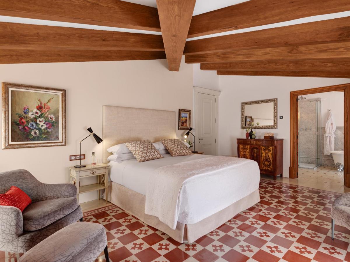 Cama o camas de una habitación en Hotel Gloria de Sant Jaume
