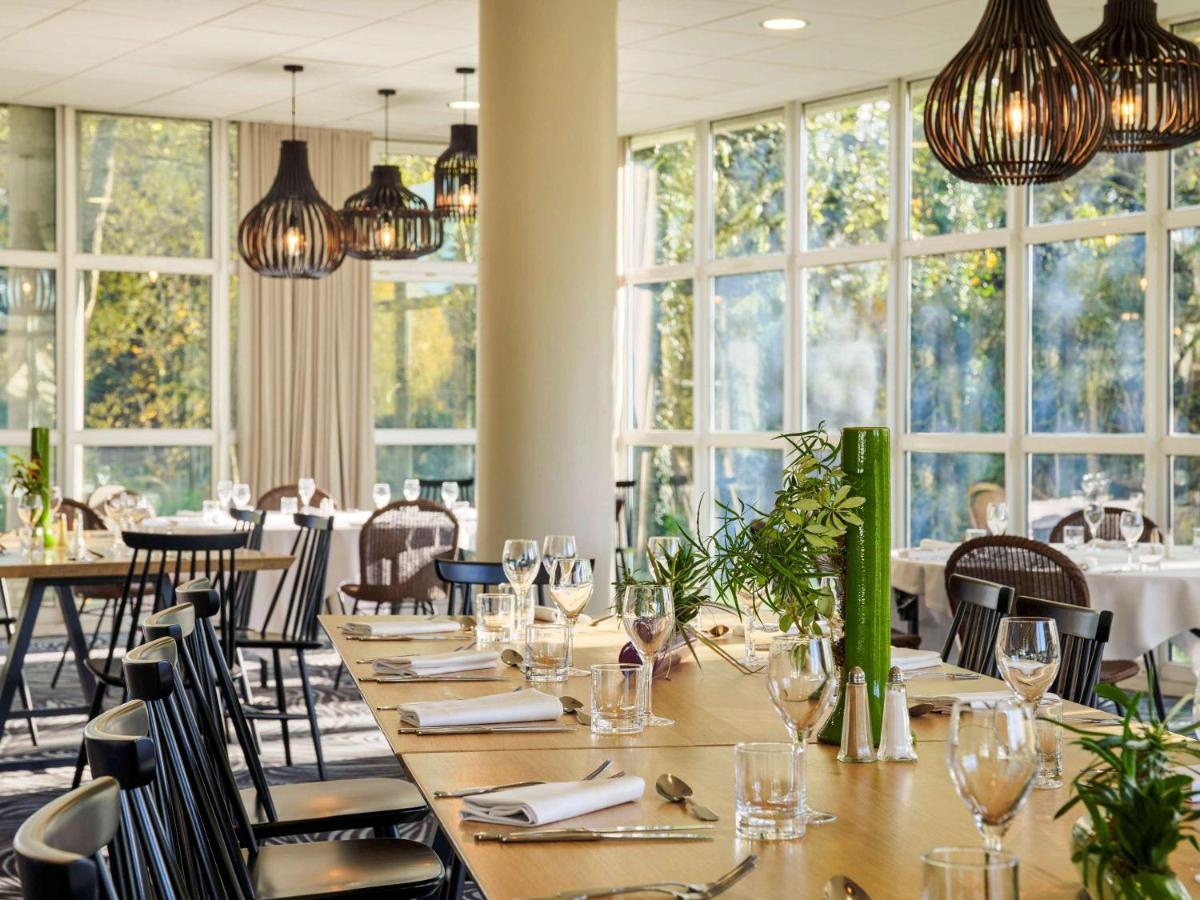Restaurant ou autre lieu de restauration dans l'établissement Novotel Senart Golf De Greenparc