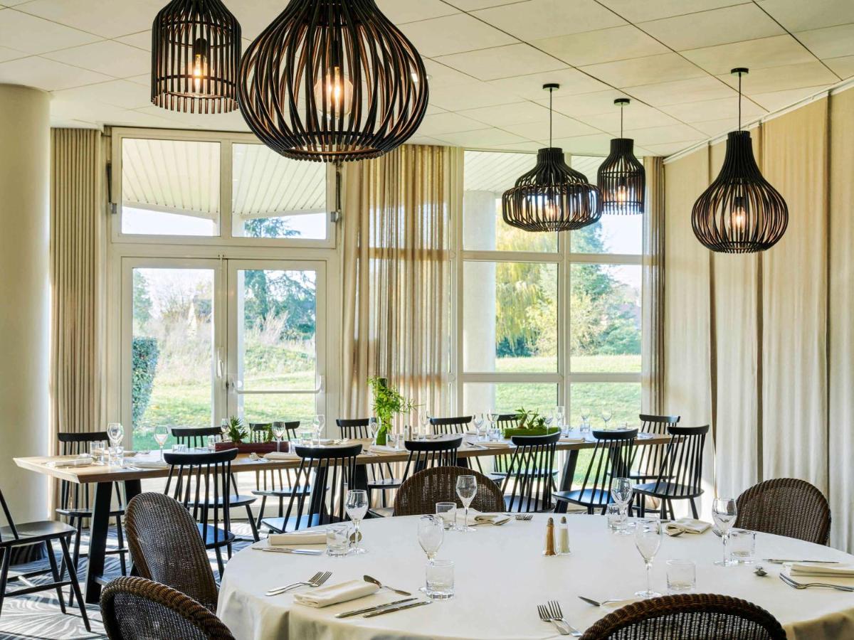 Restaurant ou autre lieu de restauration dans l'établissement Novotel Senart Golf De Greenparc