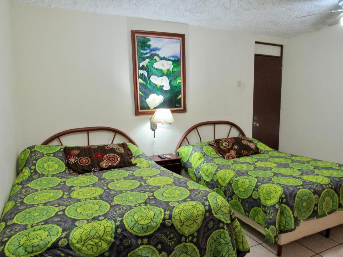 Hotel La Guaria Inn & Suites - Housity