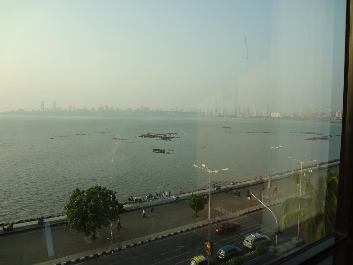 a view of a large body of water from a window at Hotel Marine Plaza in Mumbai